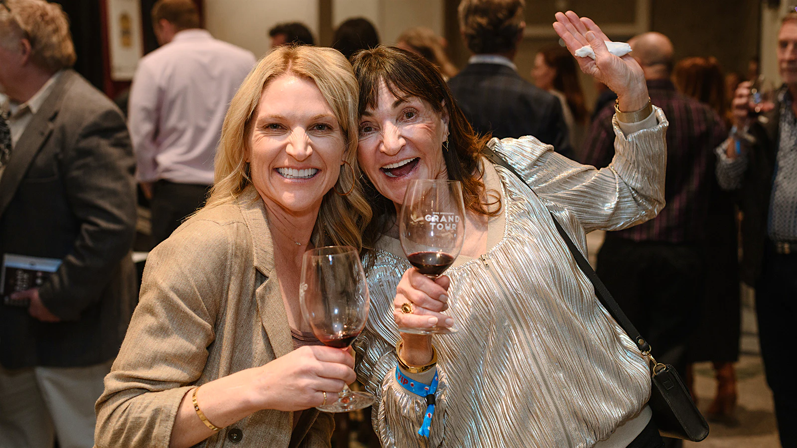Bri Barela and Sandy Griffin, two guests attending the 2026 Wine Spectator Grand Tour in Denver, Colorado.